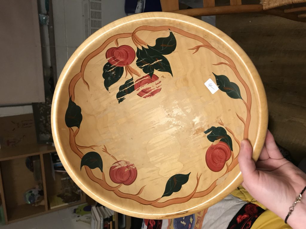 Wooden bowl, about 12 inches across, and inch an a half thick