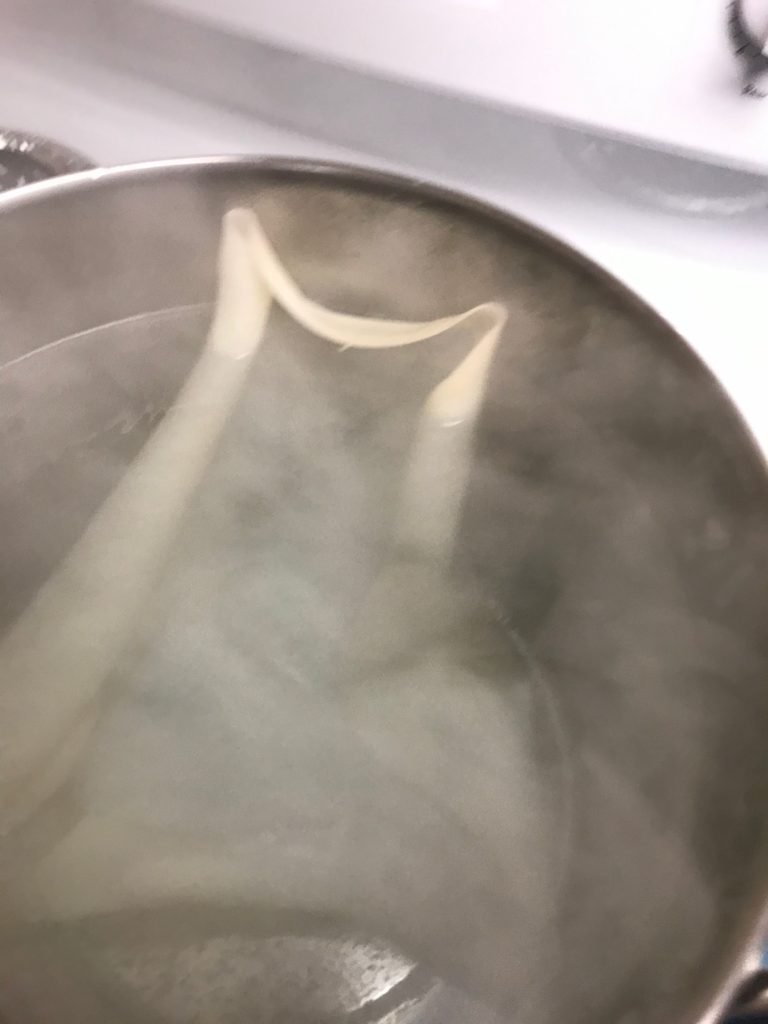 Goat skin boiling in water